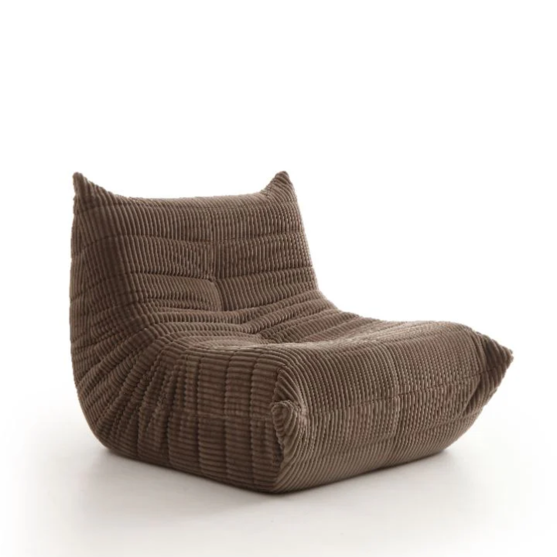 Large front view of the Rigo accent chair in beige corduroy fabric with a low-profile channeled design.