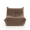 Front-facing view of the Rigo accent chair in a cool grey-toned corduroy upholstery.