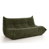 Angled view of Rigo modular sofa in forest green corduroy fabric