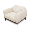 Angled view of Rodeo accent chair with premium beige fabric