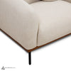 Detail of wooden base and metal legs on Rodeo accent chair