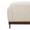 Side view of Rodeo accent chair with curved armrests