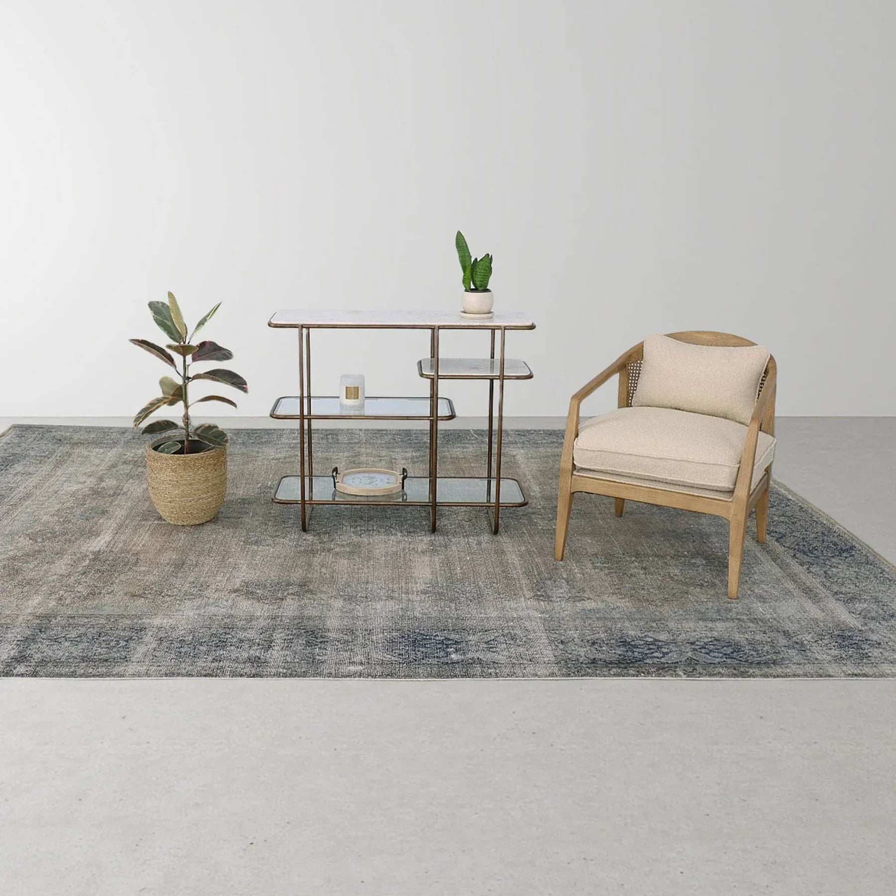 A wide shot showing the Rosa chair as part of a minimalist office or lounge area