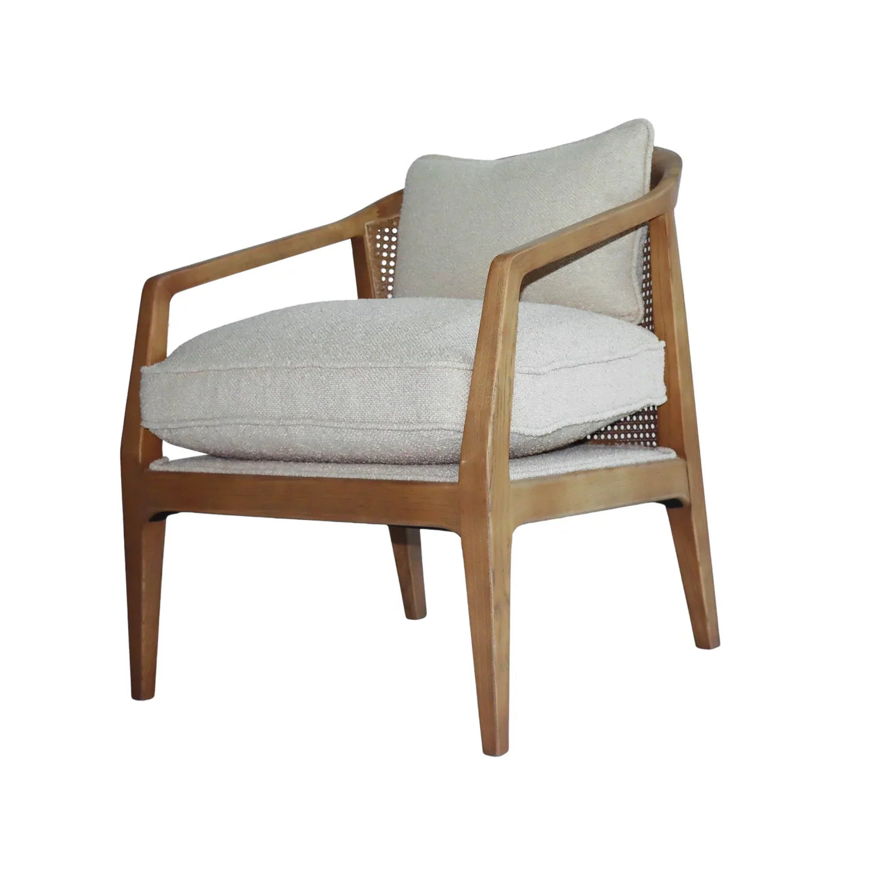 Three-quarter perspective of the Rosa chair highlighting the curved cane backrest and wood frame
