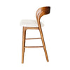 Low-profile side view of the Rotondo walnut counter stool emphasizing the tapered legs