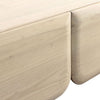 Close-up shot focusing on the smooth radius of the bottom door corners and the fine organic texture of the natural ash wood