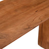Macro shot focusing on the smooth rounded edge of the tabletop and the fine texture of the wood finish