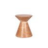 Three-quarter view of the Rumi side table featuring a sculptural hourglass silhouette crafted from natural red travertine stone