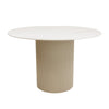 Front view of the Rune round dining table featuring a white marble tabletop with grey veining and a beige fluted cylindrical pedestal base
