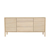 Front view of the Runway light oak sideboard featuring a central 3-drawer stack flanked by two doors with horizontal slotted textures
