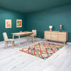 Wide lifestyle view featuring the sideboard as part of a complete rustic wood dining collection with a matching table and bench