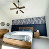 Wide lifestyle perspective showcasing the nightstand alongside a coordinating wood bed frame in a naturally lit room
