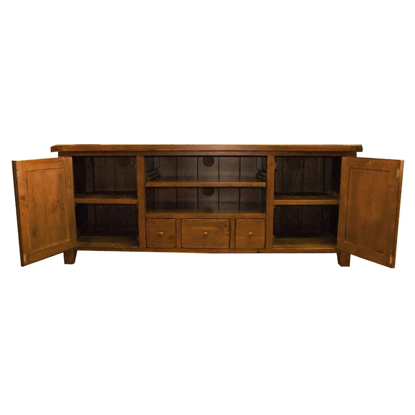 Front view of the large Irish Coast media unit in a warm sundried pine finish featuring two side cabinets and three central storage drawers