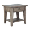 Three-quarter angle view of the African Dusk grey wash nightstand highlighting the natural wood grain and tapered leg design