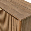 High-angle close-up highlighting the natural variegated wood grain and textured finish of the sideboard's top surface