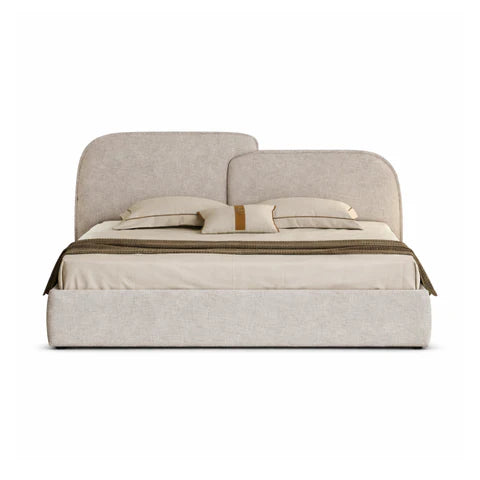 Front view of the Rusty storage bed featuring a textured cream fabric and a unique asymmetrical curved headboard