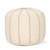 Front view of the Sachi round pouf in beige textured fabric with decorative vertical brown stitching creating a ribbed effect