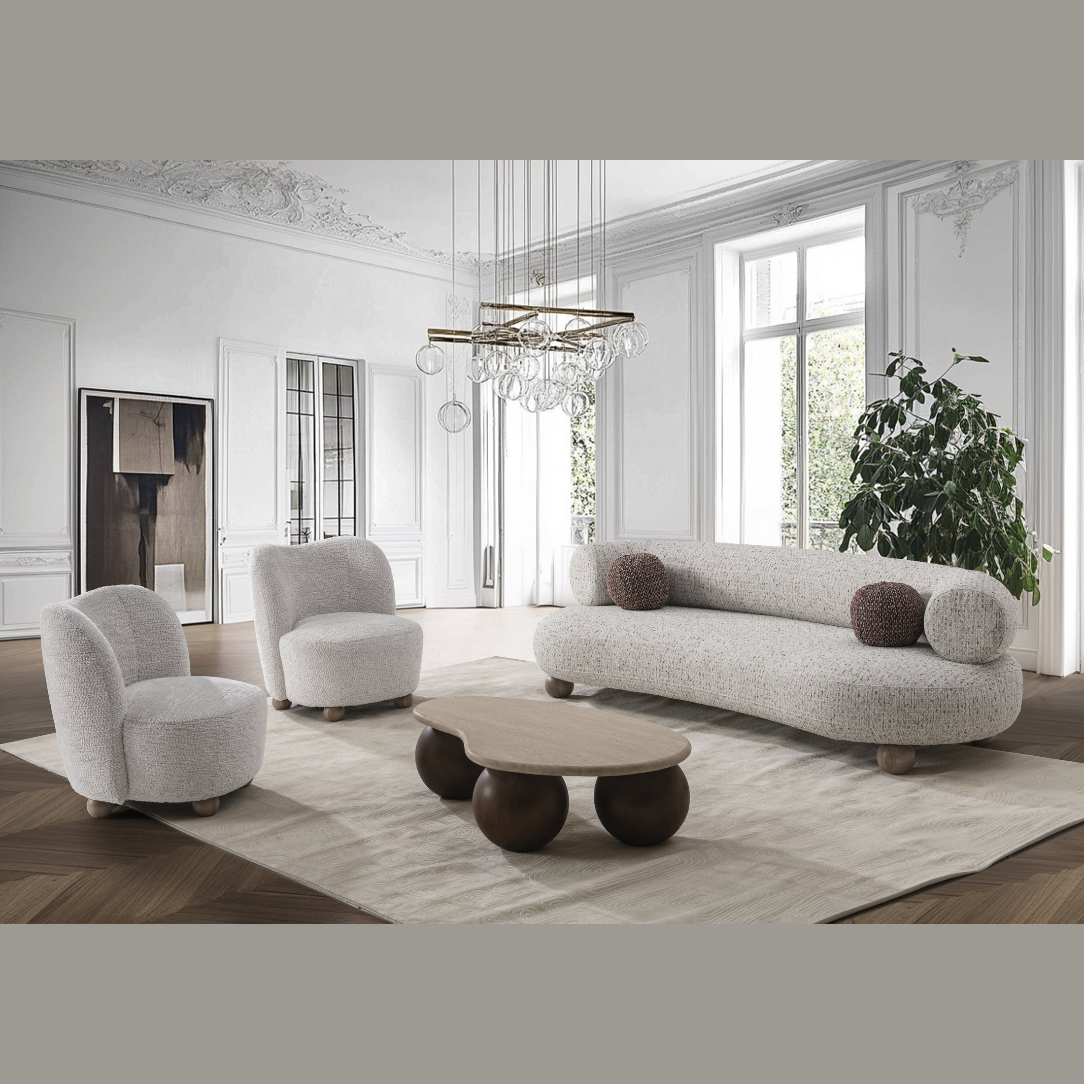 Saga Accent Chair in Oatmeal bouclé fabric featuring a rounded silhouette and wooden ball feet.