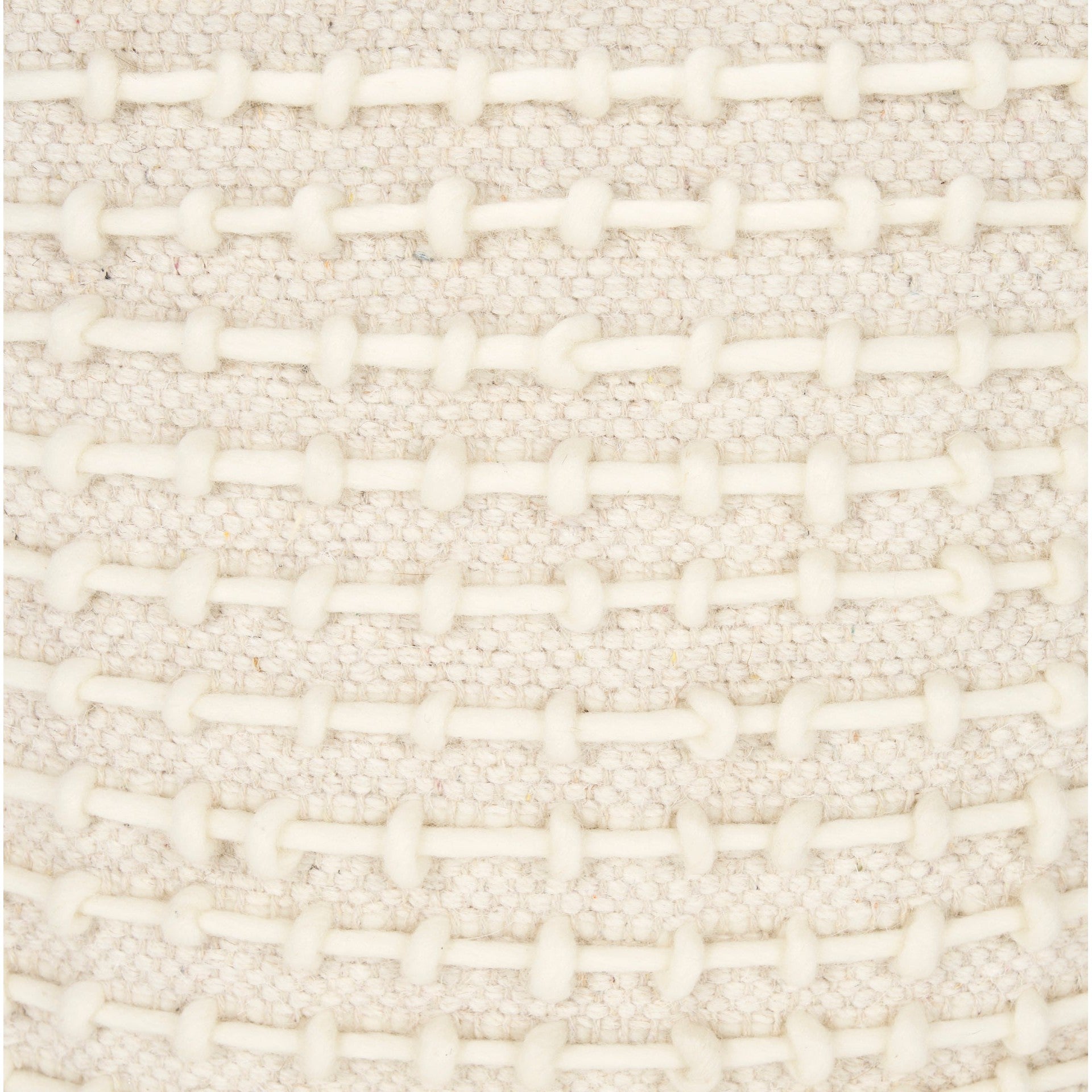 Straight-on front view showing the uniform square silhouette and consistent cream stitching across the beige surface