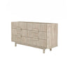 Three-quarter perspective view highlighting the rounded corners and the continuous fluted wood texture across the drawer fronts