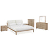 Wide lifestyle shot featuring the bed in a bright modern suite with light gray walls and contemporary abstract wall art
