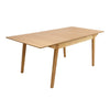Three-quarter perspective view highlighting the clean joinery and the smooth natural wood grain of the extended tabletop