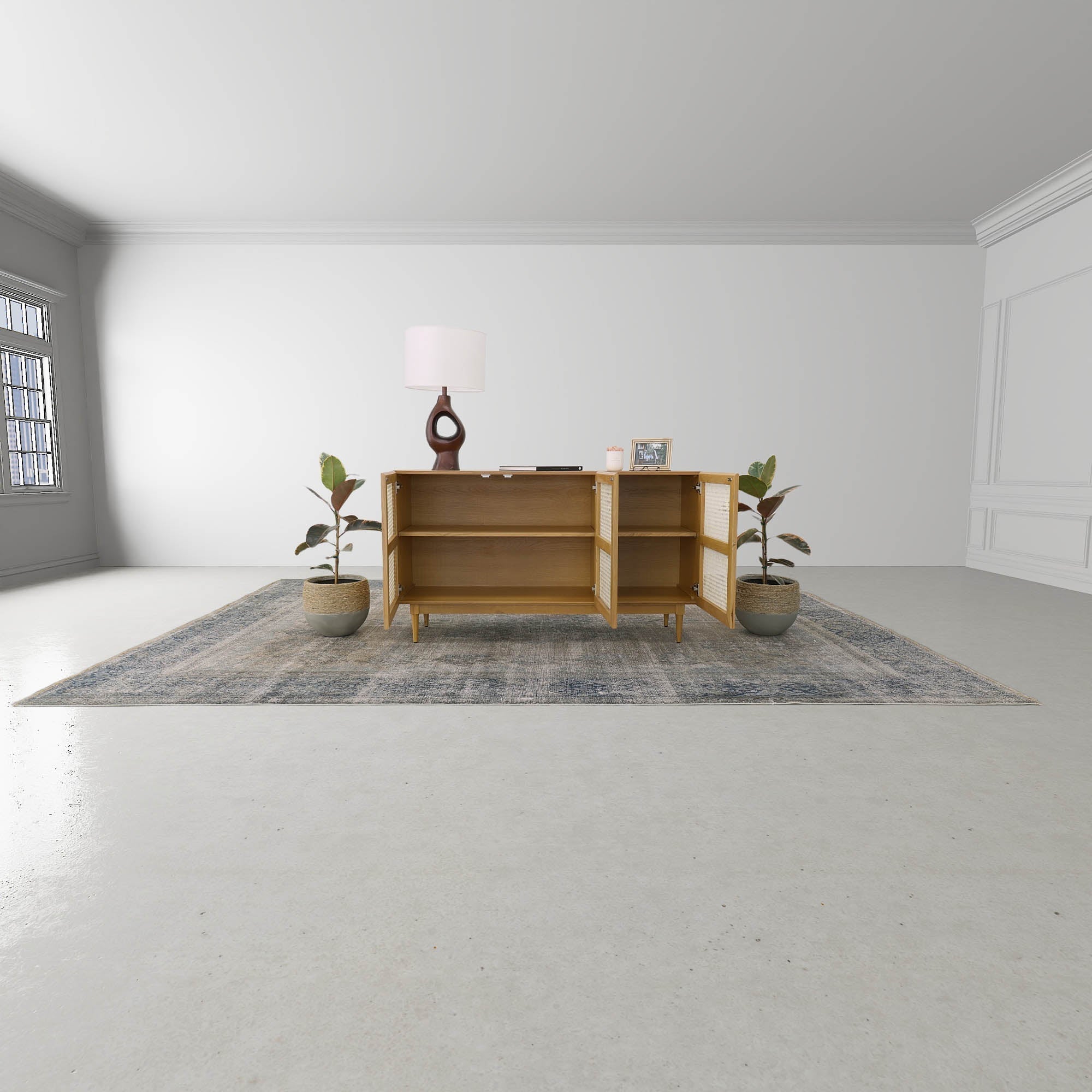 Straight-on front view of the Cane sideboard featuring a light natural oak frame and three woven rattan door panels