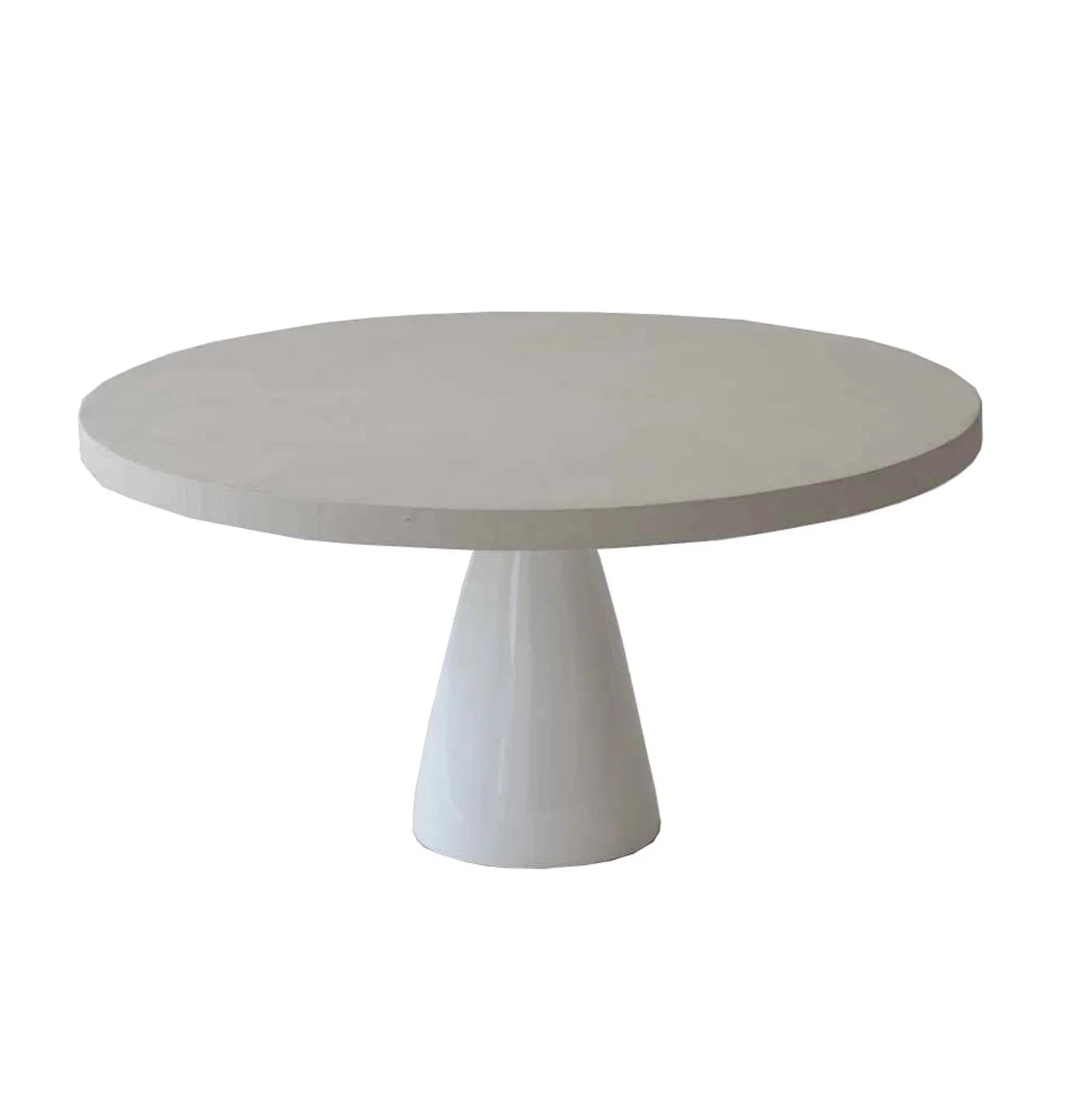 Front view of the Sculpture coffee table featuring a large circular top and a tapered conical pedestal base in a smooth white concrete finish
