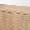 Macro shot highlighting the high-quality curved corner construction and the organic light brown wood grain texture