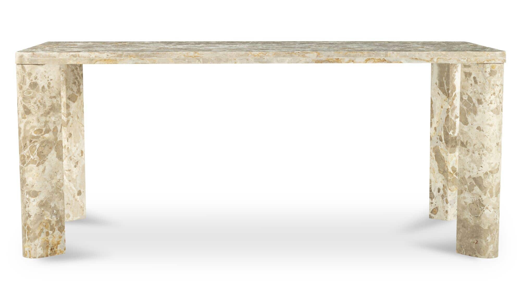 Front view of the Segment dining table in beige panther stone featuring a thick rectangular top and rounded architectural legs