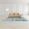 Lifestyle view of Sereno wood and white accent table on a teal area rug
