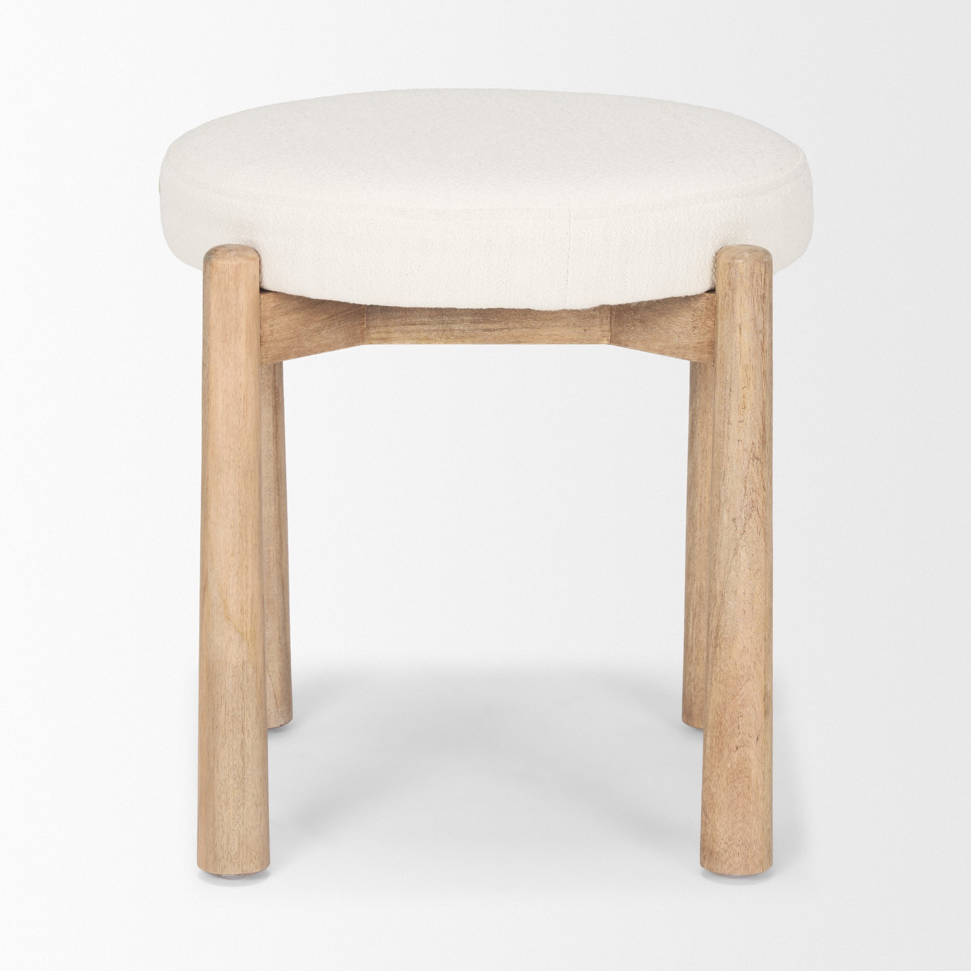 Front three-quarter view of the Shaiden stool featuring a light brown wood frame and a circular cream upholstered seat