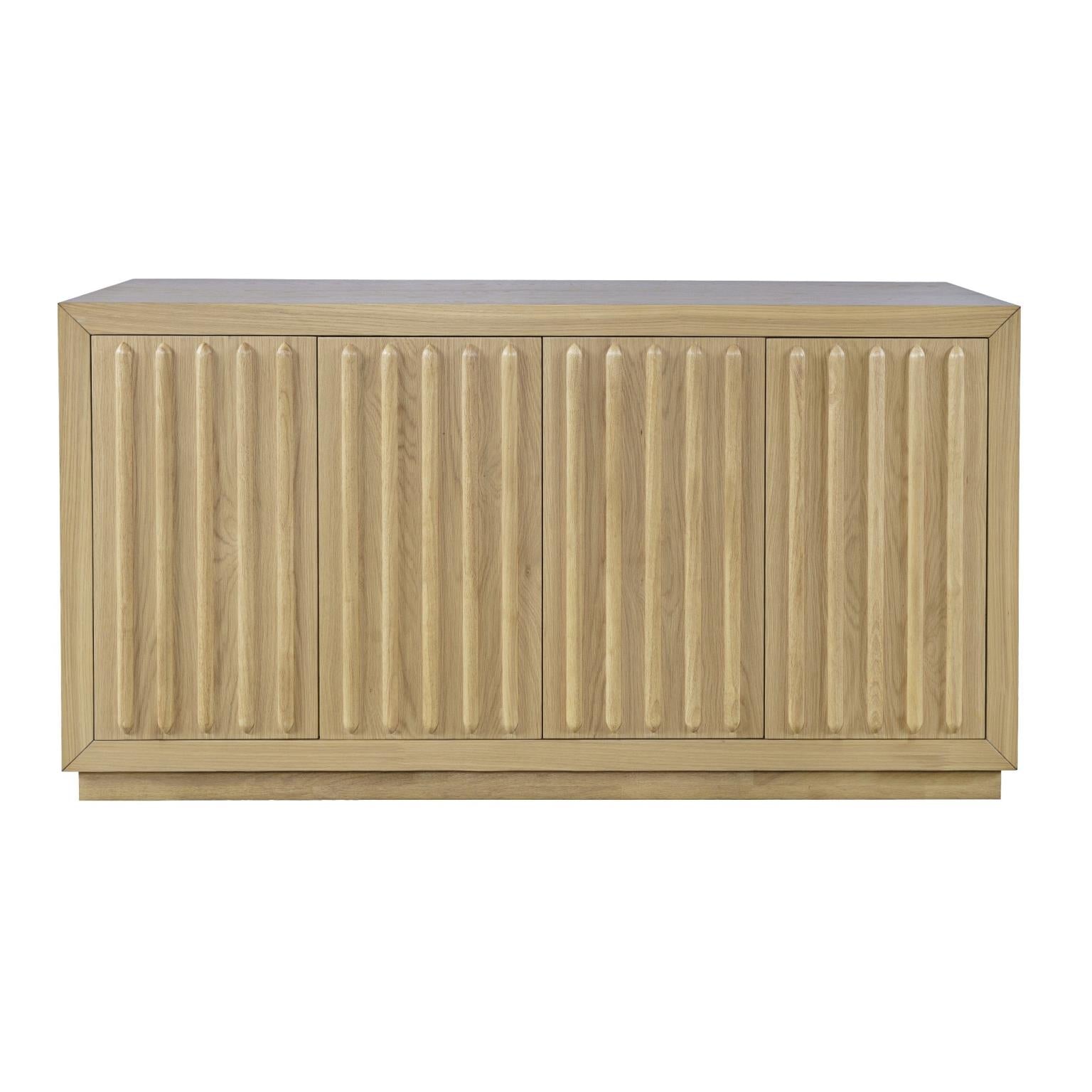 Front perspective view of the Skap 4-door sideboard in a dark oak finish featuring vertical fluted door panels and a matching plinth base