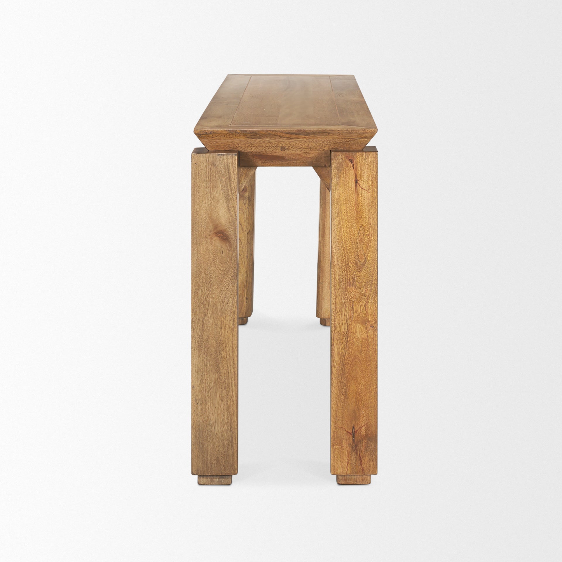 Front view of the Sapphira console table in a rich brown wood finish featuring a thick rectangular top and architectural block legs