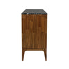 Side profile view highlighting the thick black marble surface and the elegant taper of the acacia wood legs
