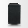 Side profile view of the black sideboard highlighting the deep vertical storage and the architectural leg profile