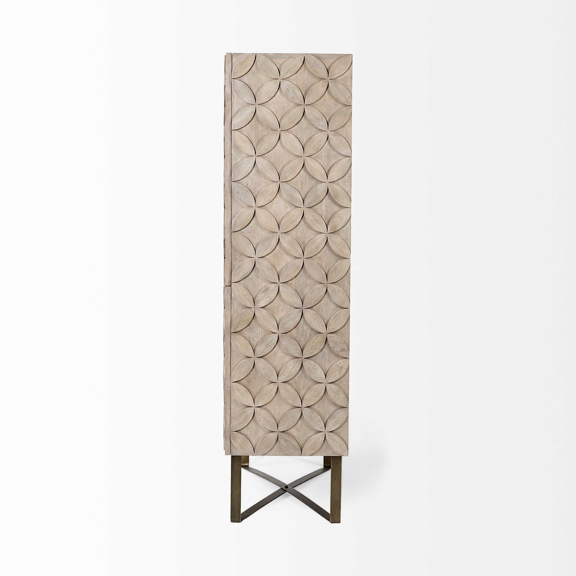 Three-quarter perspective view of the Excelsior II storage cabinet featuring a light brown wood finish, a decorative scalloped motif on the doors, and a gold iron X-base