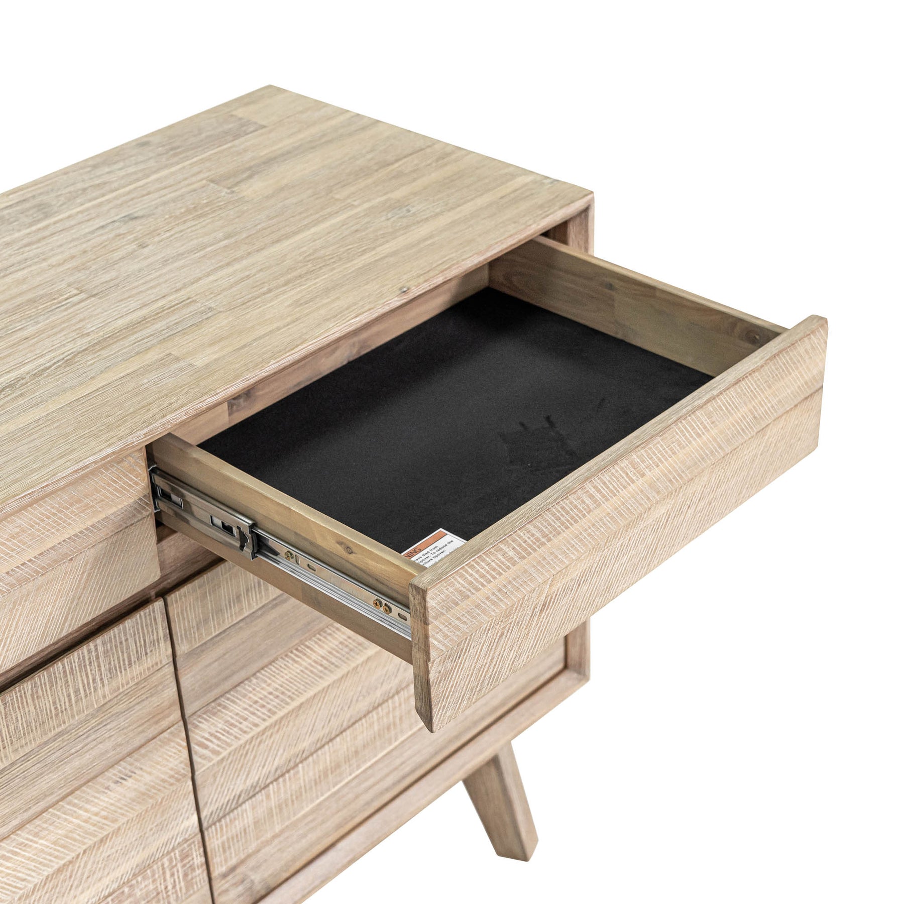 Front perspective view of the Gia sideboard featuring natural wood construction with horizontal textured paneling and three top drawers
