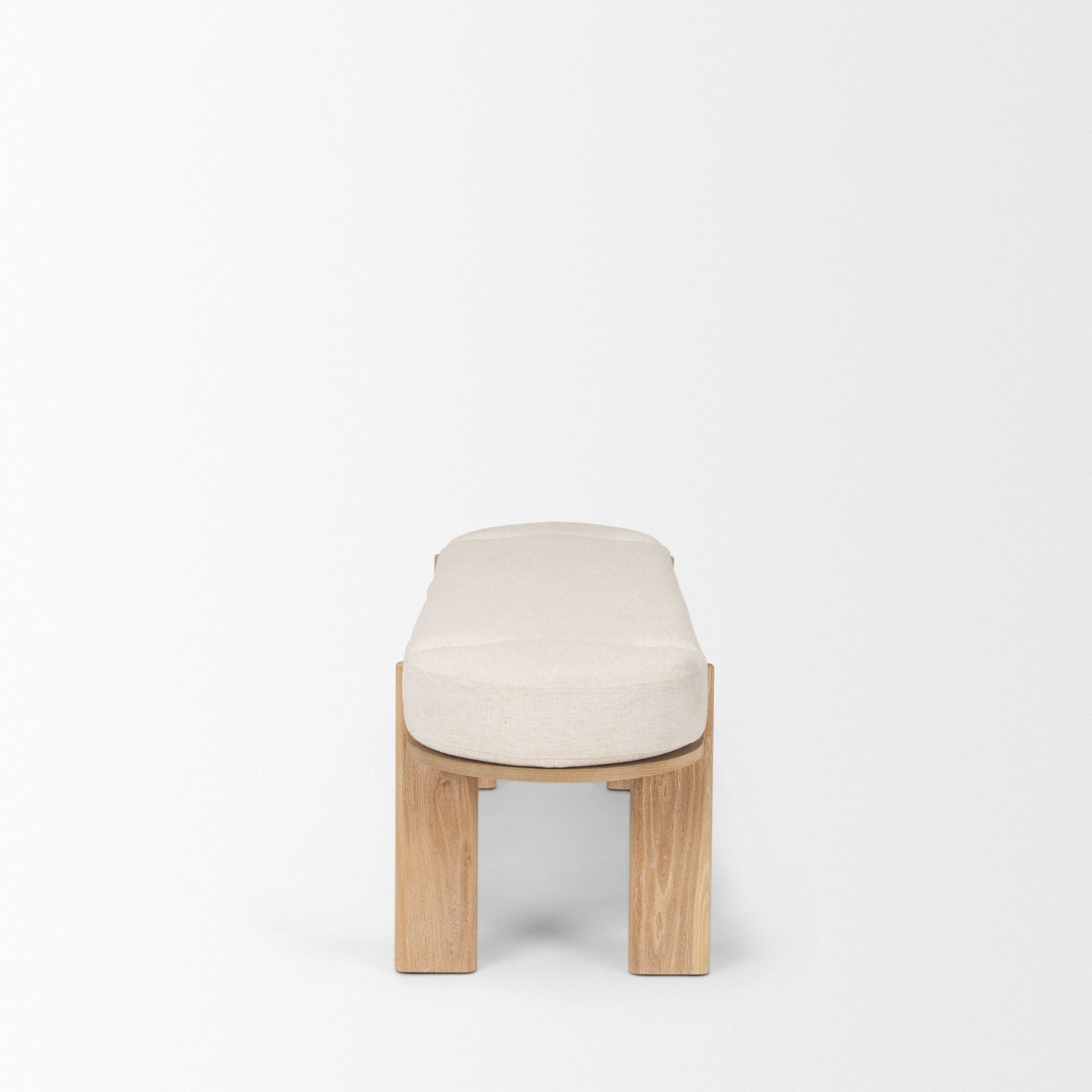 Front view of the Sohan bench featuring a light brown elm wood frame and an oatmeal-colored upholstered seat