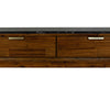 Close-up front view focusing on the two storage drawers featuring slim, horizontal brushed gold metal handles