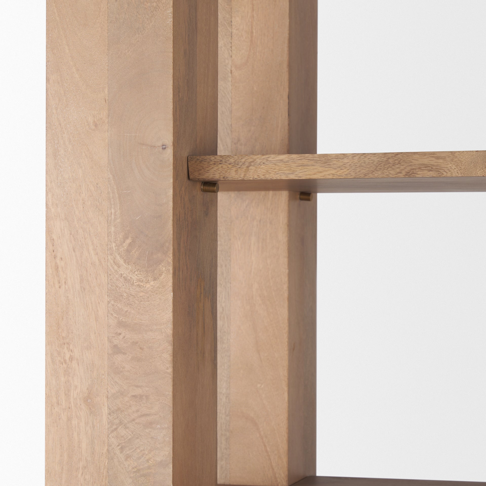 Straight-on front view highlighting the architectural vertical pillars and symmetrical open shelving