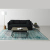 Alternative lifestyle view of the nesting tables styled with an open book on top in a bright contemporary living space