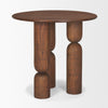 Perspective shot highlighting the rich dark wood grain and the architectural silhouette of the tiered pedestal legs