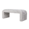 Side view of the small light gray upholstered bench highlighting the seamless transition from seat to base