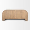 Front view of the Sorina sideboard featuring light brown wood construction with intricate reverse fluted door panels and an elegant arched base