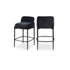 Comparison view of the Sorte counter stool in both black and cream fabric options