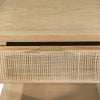 High-angle shot focusing on the smooth square tabletop surface and light oak wood grain texture