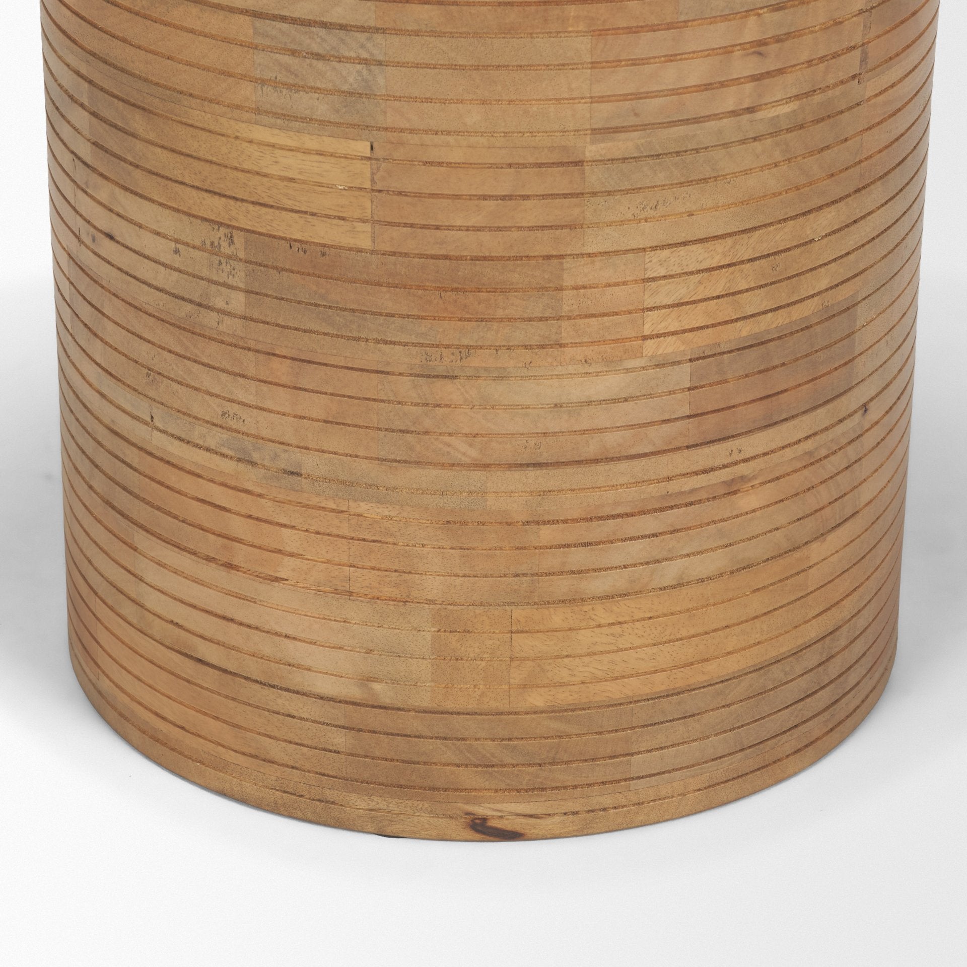 Front view of the Stack accent table featuring a circular top supported by a sculptural wood sphere and a ribbed cylindrical base