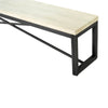 Close-up shot focusing on the industrial black metal cross-brace design that provides stability to the bench frame