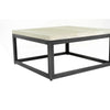 Direct overhead view of the square travertine tabletop highlighting the natural stone patterns and symmetrical form